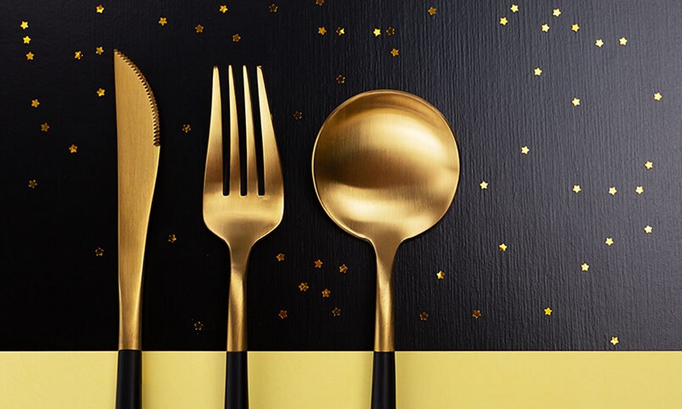 festive flatware serving ware on starry background